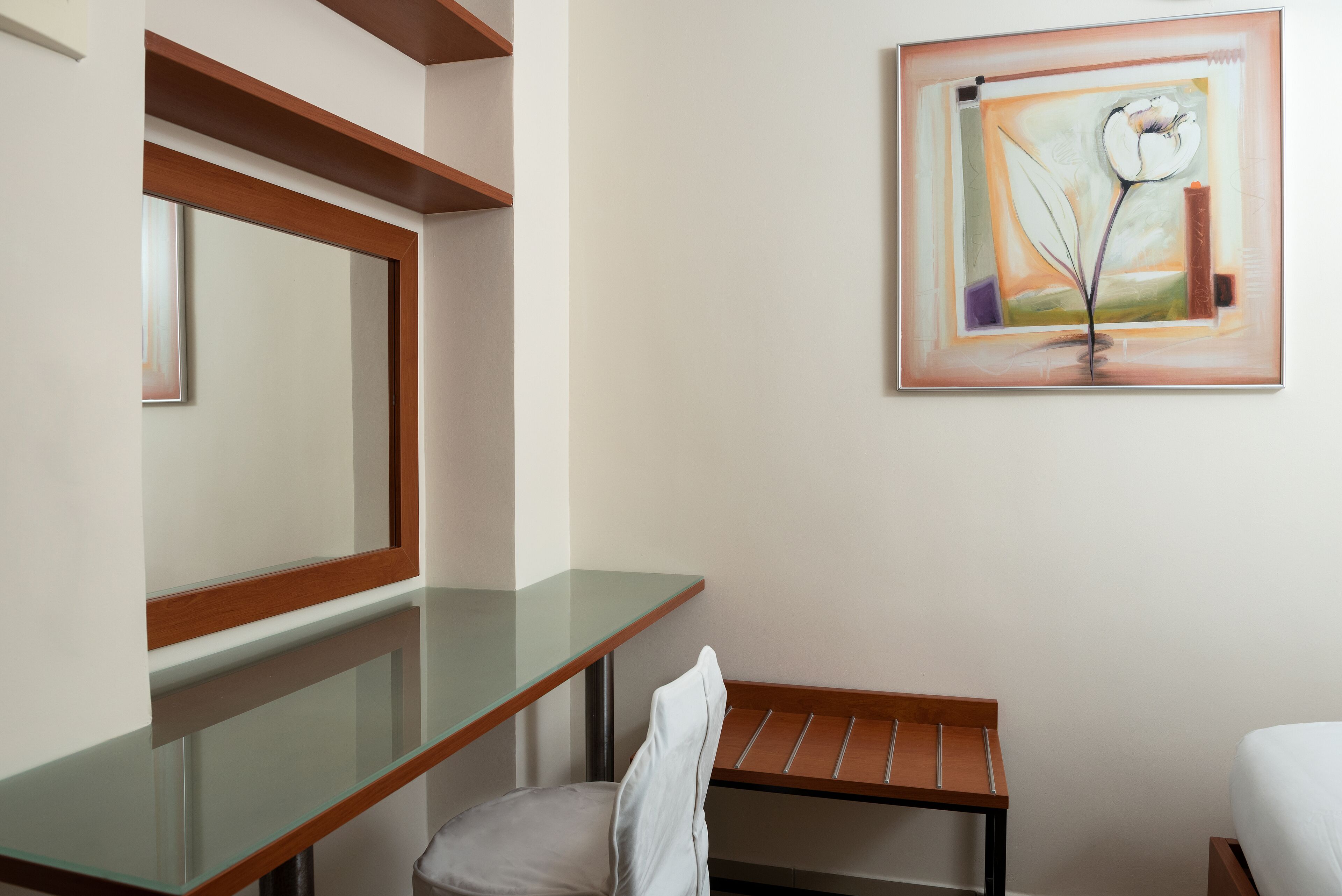 economy room | in-room safe, desk, blackout curtains, soundproofing