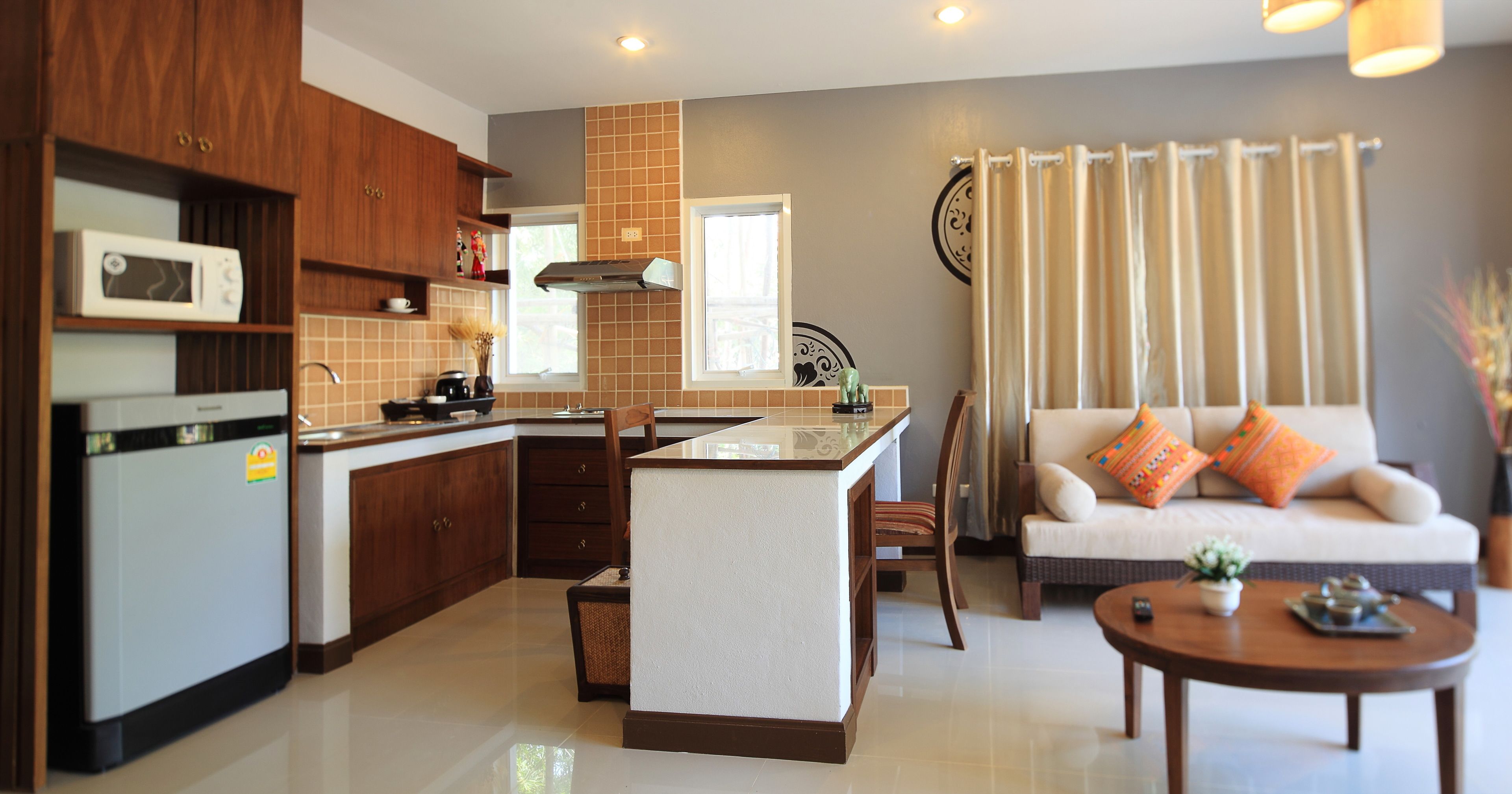 one bedroom grand suite with balcony | private kitchen | fridge, microwave, electric kettle