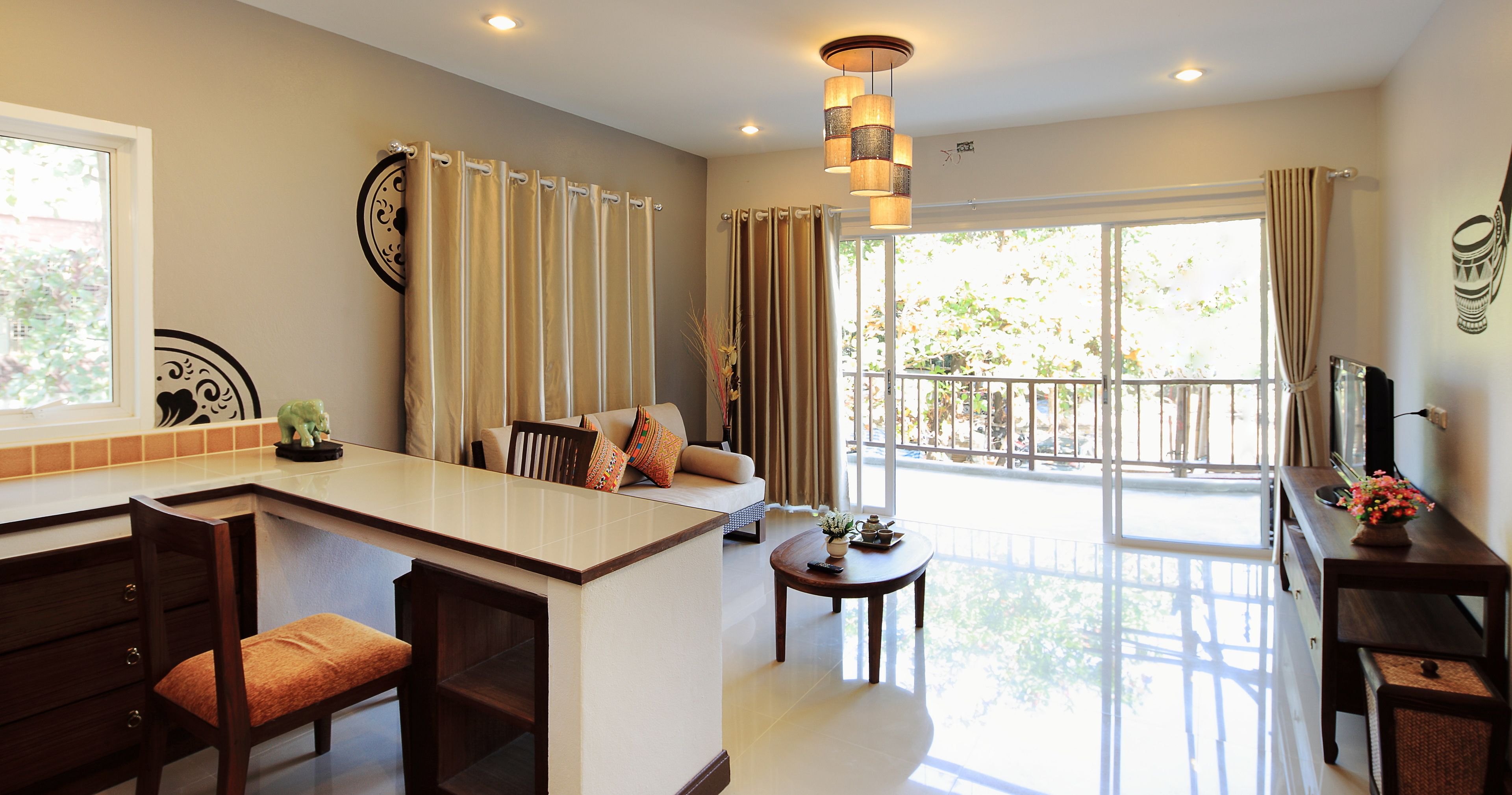 one bedroom grand suite with balcony | living room | led tv, dvd player