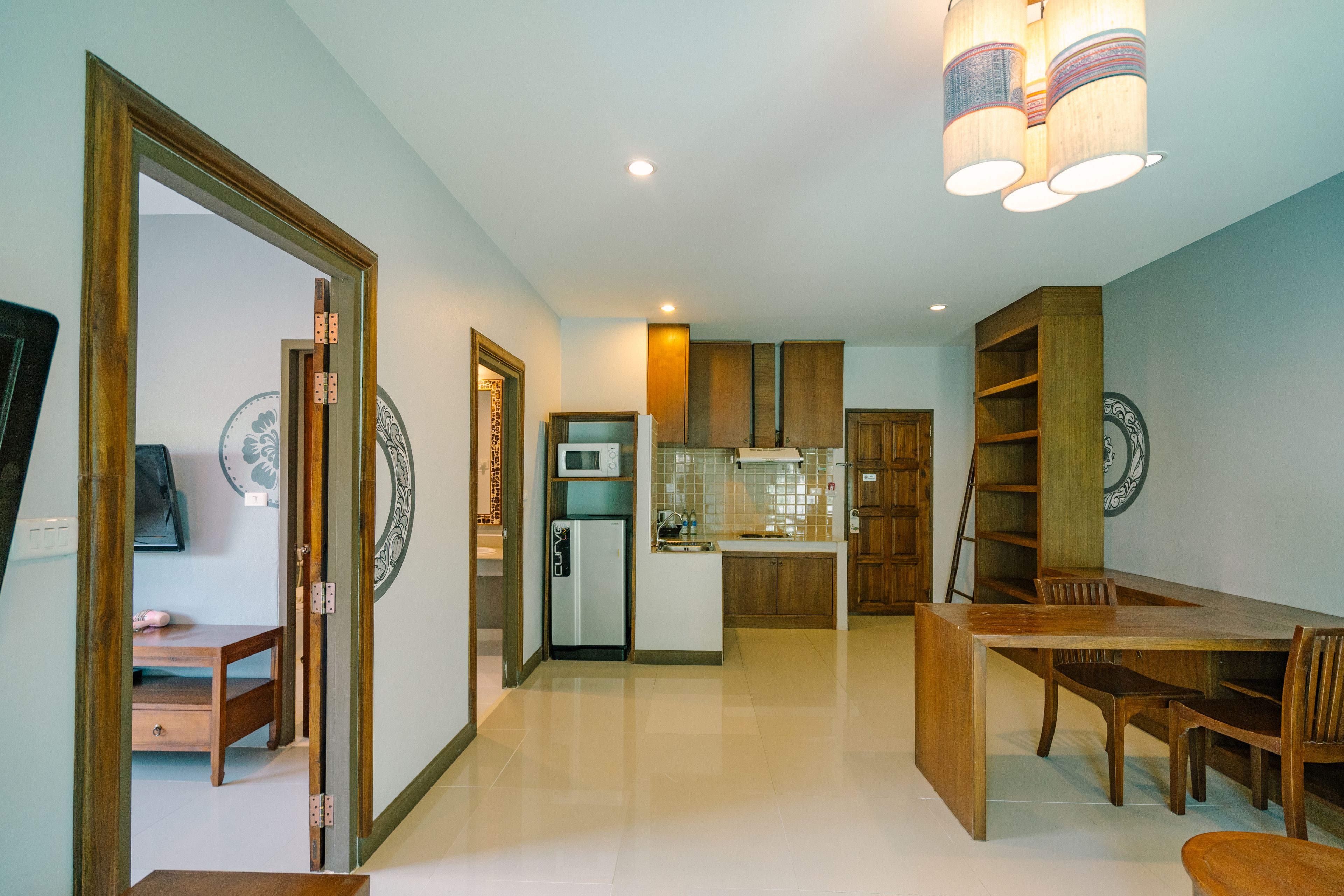 one bedroom grand suite with balcony | private kitchenette | fridge, microwave, electric kettle