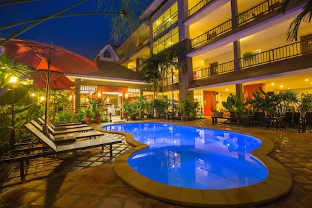 Outdoor pool, open 8 AM to 10 PM, pool umbrellas, sun loungers
