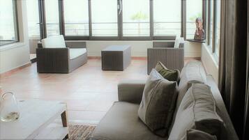 42-inch flat-screen TV with satellite channels, TV