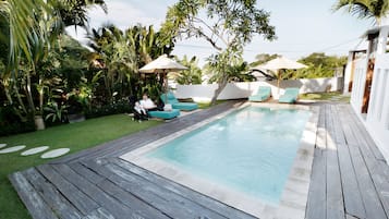 Outdoor pool, pool umbrellas, pool loungers