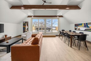 Standard Suite, 2 Bedrooms, Kitchen, Lake View | Living area | 50-inch TV with digital channels, streaming services - Arka Motel (Rogers)