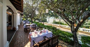 Breakfast, lunch, dinner served; Asian cuisine, garden views