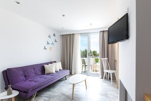 Room, Sea View (Maisonette) | Living area | TV - Memories Beach Hotel (Santorini)