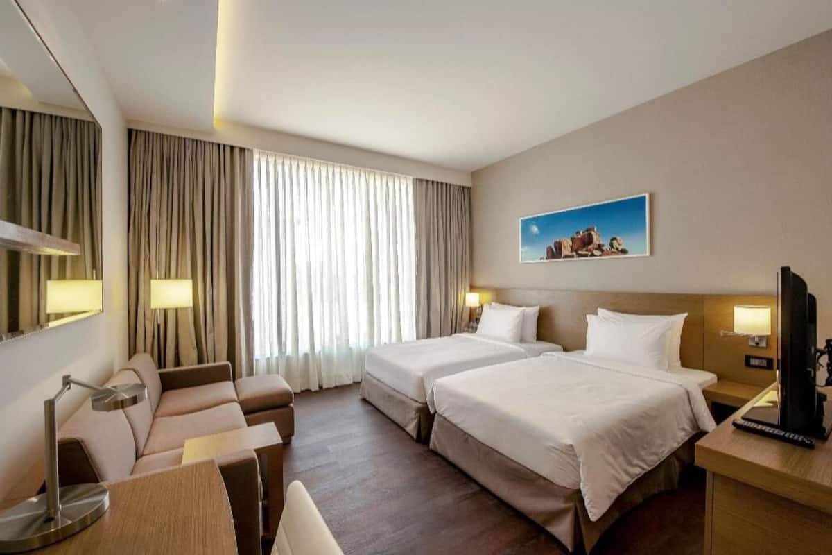 Premium bedding, pillow-top beds, in-room safe, individually decorated