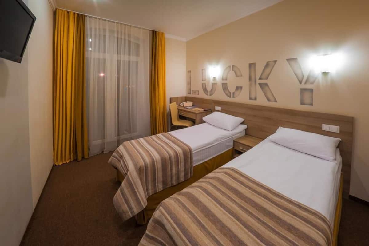Standard Twin Room, 2 Twin Beds | Desk, laptop workspace, iron/ironing board (on request), WiFi (free)