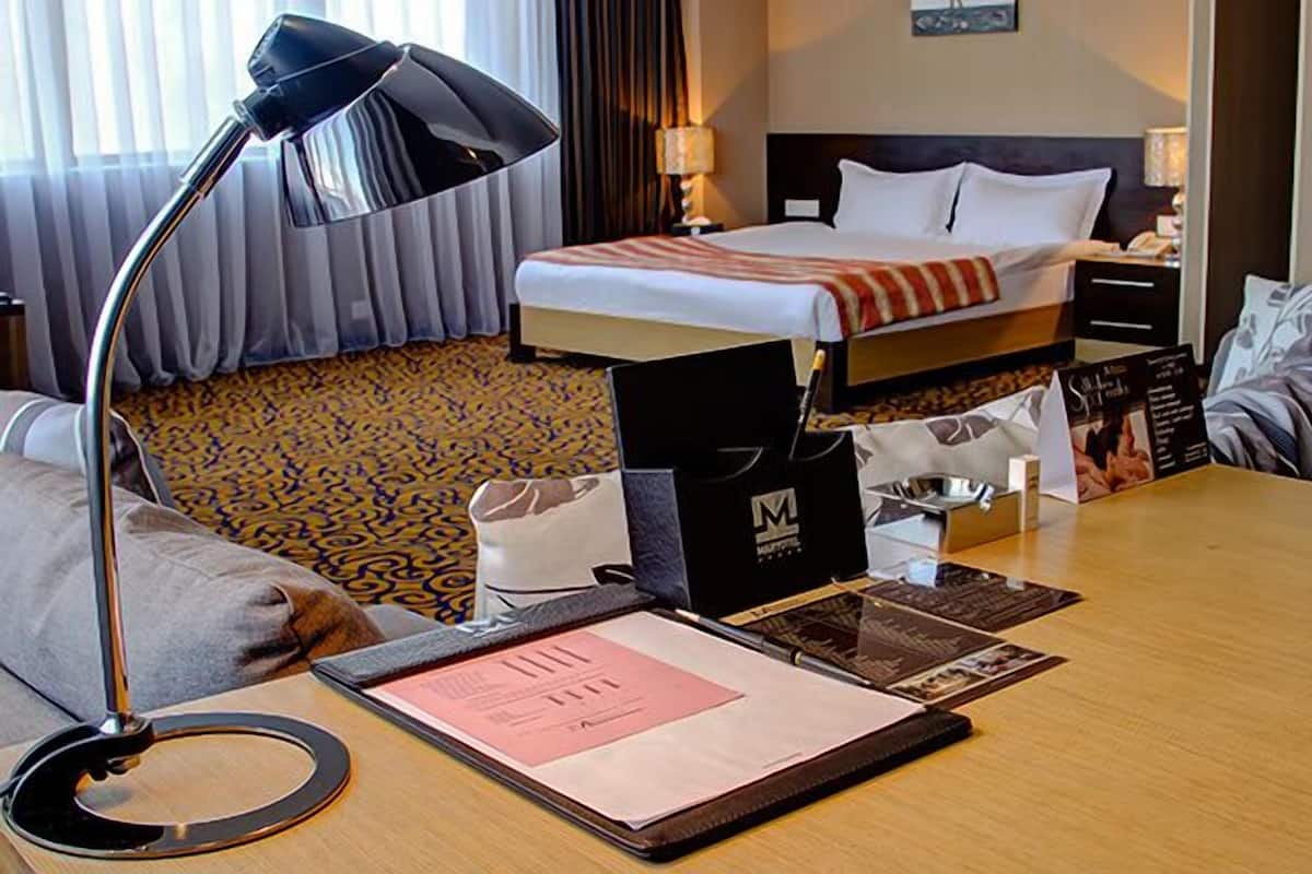 Junior suite | Een kluis op de kamer, een bureau, gratis babybedden, extra bedden
