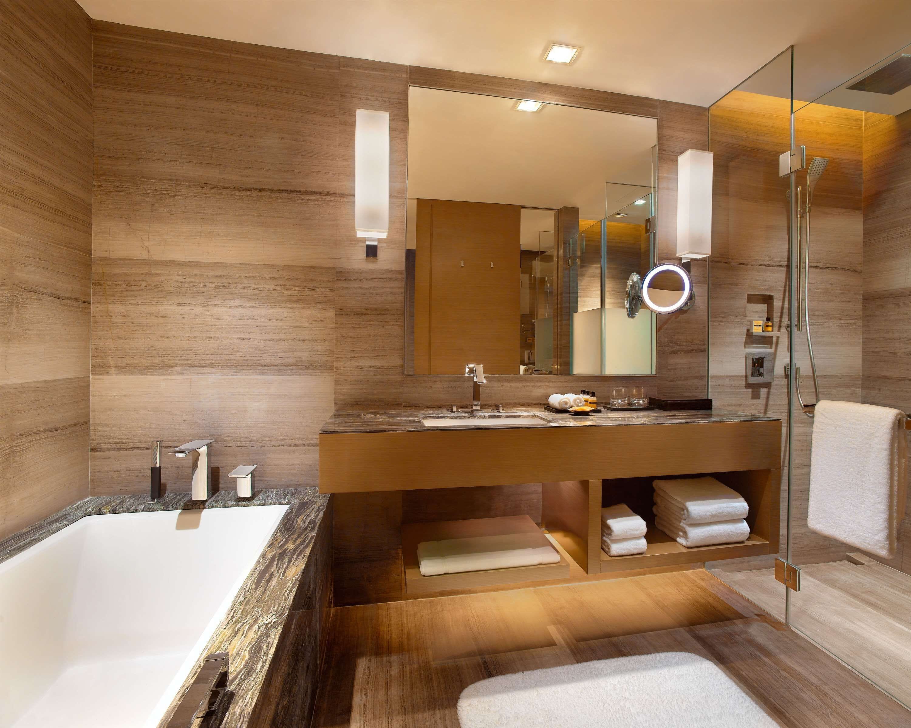 separate bathtub and shower, hair dryer, bathrobes, bidet