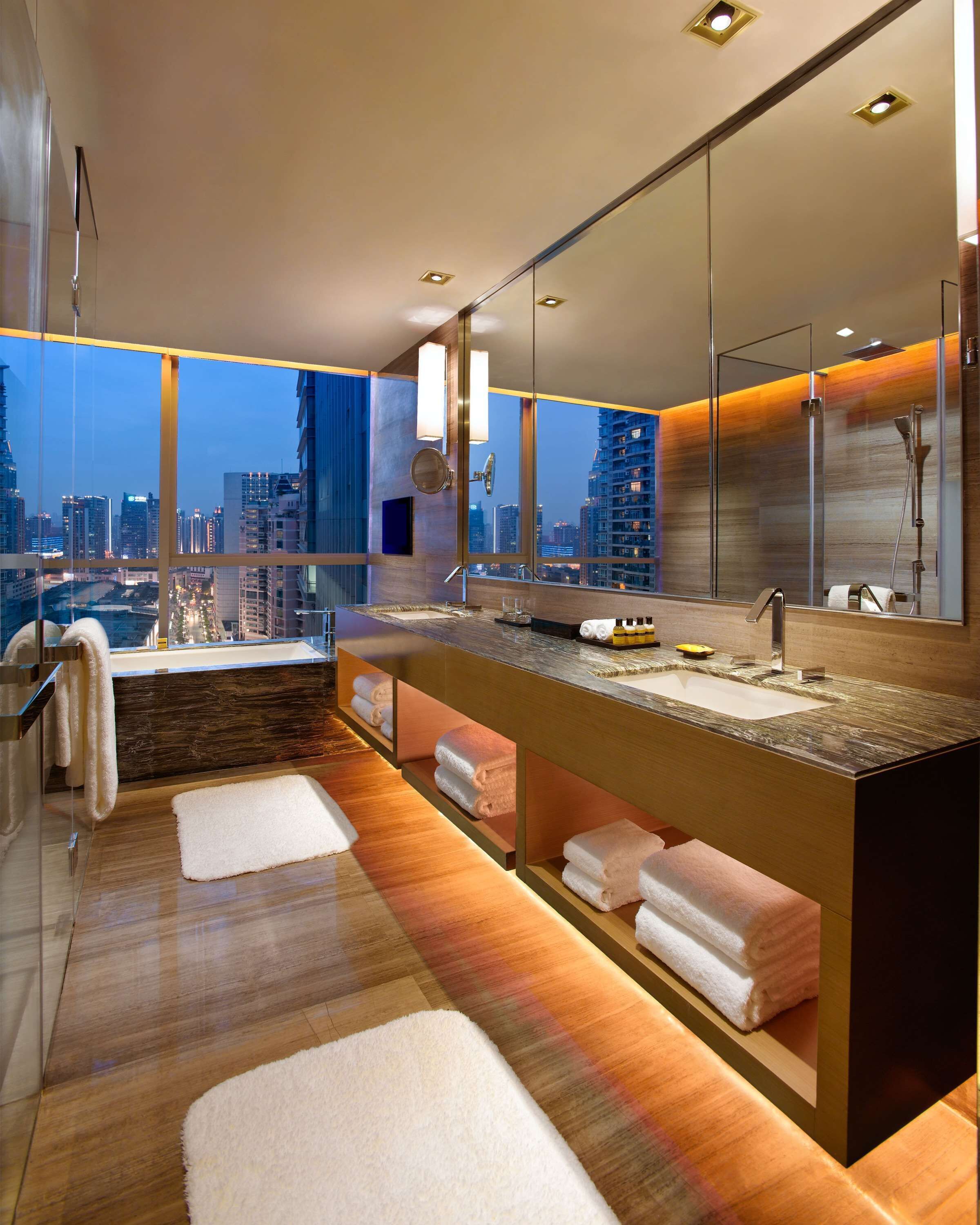 separate bathtub and shower, hair dryer, bathrobes, bidet