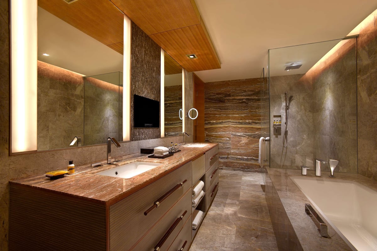 regency executive suite, 1 king bed (23f-27f) | bathroom | separate bathtub and shower, hair dryer, bathrobes, bidet