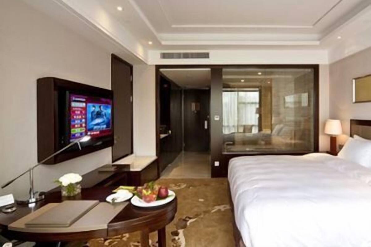 Habitación ejecutiva, 1 cama King size, piso ejecutivo | Minibar, caja de seguridad en la habitación, cunas y despertador