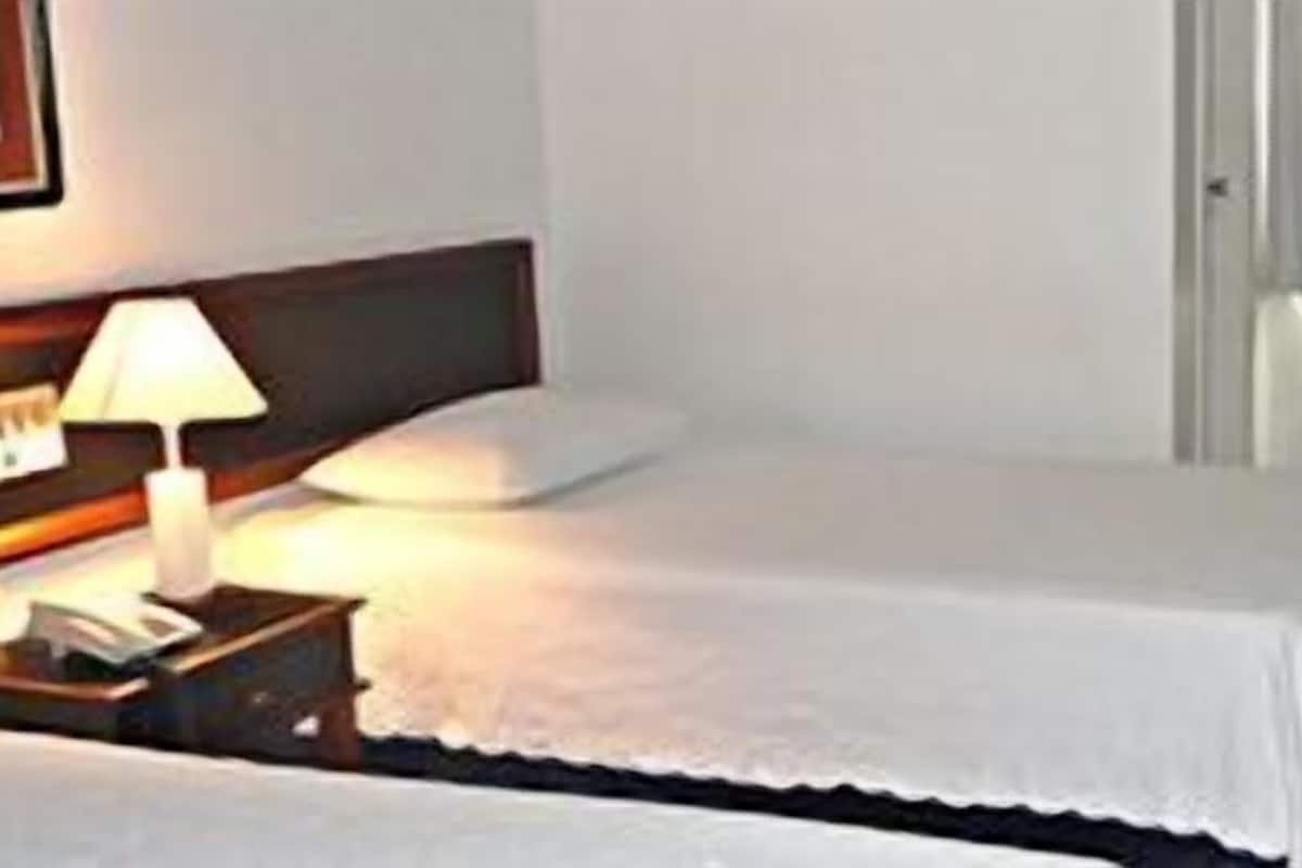 Minibar, ameublement personnalisé, Wi-Fi gratuit, draps fournis