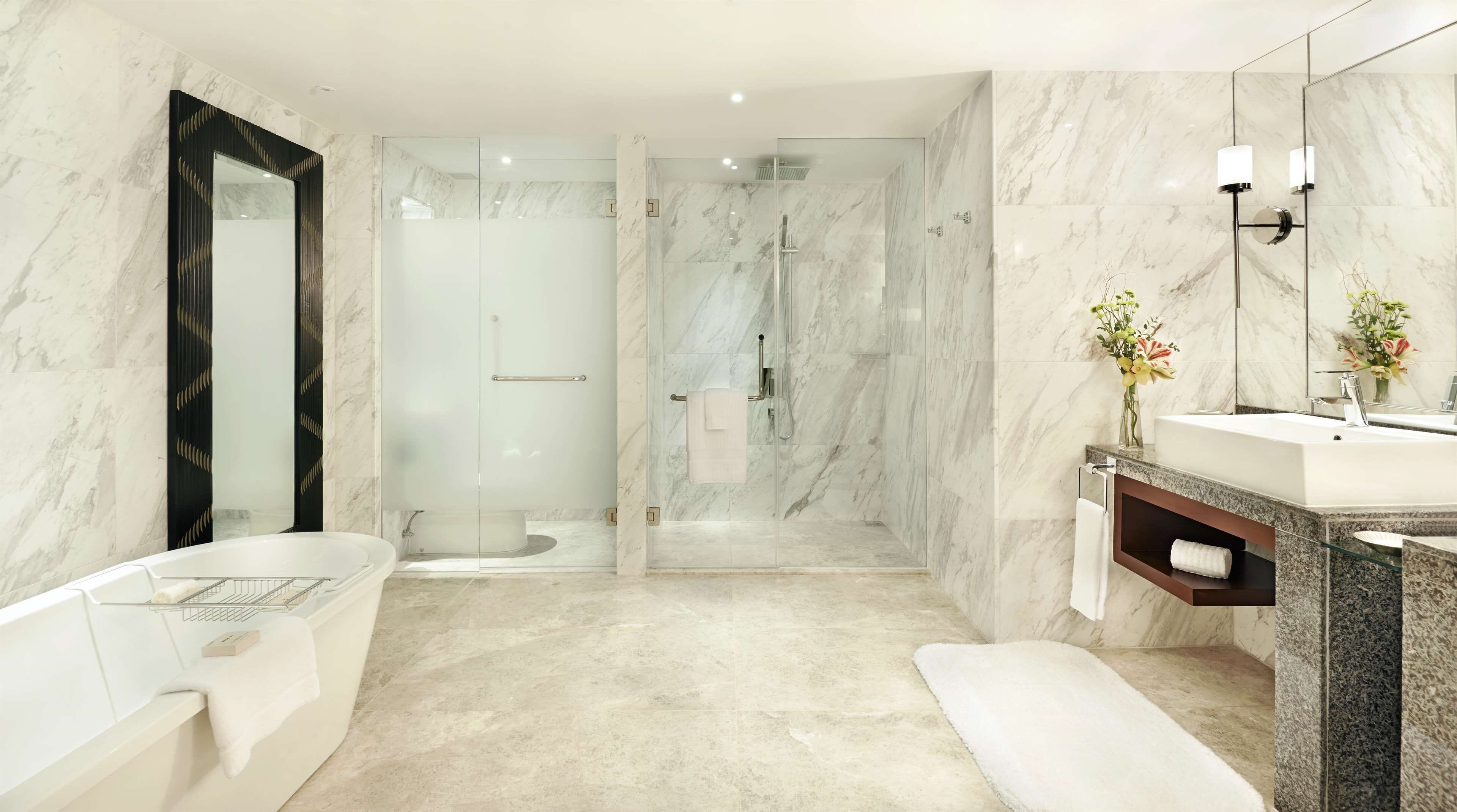 separate bathtub and shower, deep-soaking bathtub, rainfall showerhead