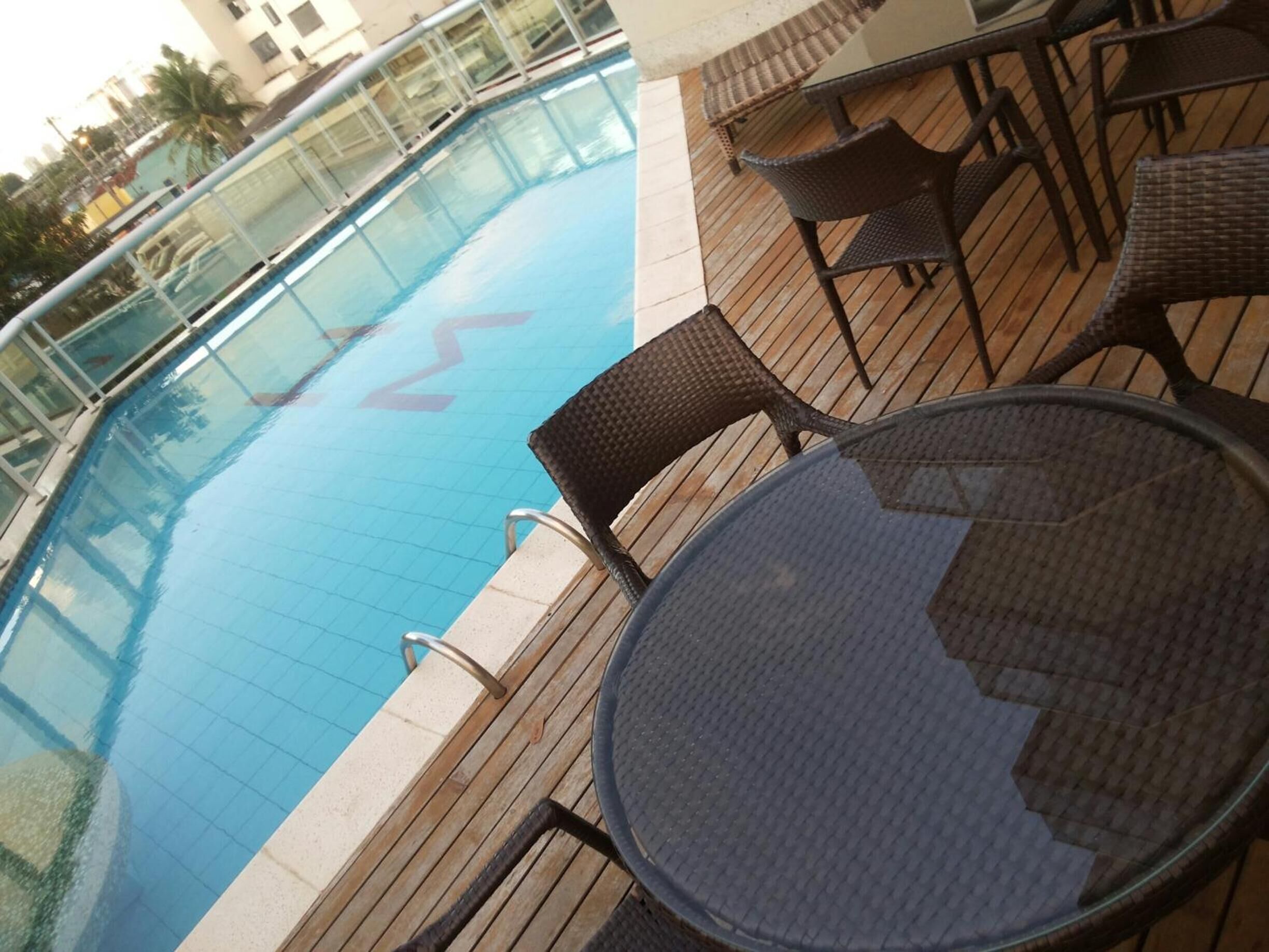 outdoor pool, pool umbrellas, pool loungers