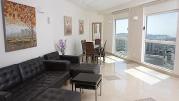 Luxury Penthouse, 3 Bedrooms, Sauna | Living area | 40-inch flat-screen TV with cable channels, TV, DVD player