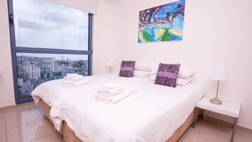 Deluxe Apartment, 2 Bedrooms | 1 bedroom, desk, blackout curtains, iron/ironing board