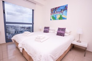 Deluxe Apartment, 2 Bedrooms | 1 bedroom, desk, blackout drapes, iron/ironing board