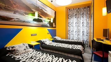 Executive Quadruple Room | In-room safe, individually decorated, individually furnished, desk