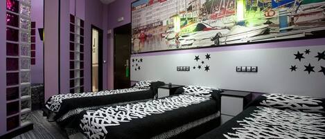 Executive Quadruple Room | In-room safe, individually decorated, individually furnished, desk