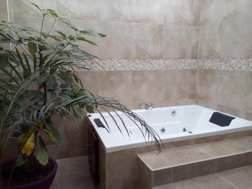 superior suite, 1 queen bed, jetted tub, garden view | premium bedding, minibar, in-room safe, blackout curtains