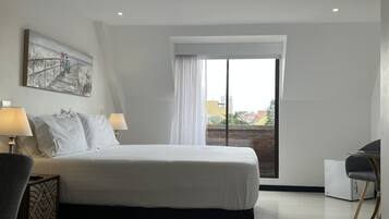 Suite Deluxe | Ropa de cama de alta calidad y minibar