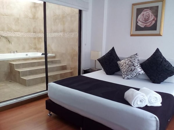 Ropa de cama de alta calidad y minibar