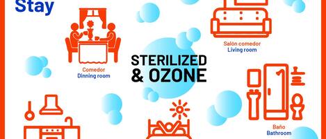 L’intérieur d’un hôtel comprenant une salle à manger, une cuisine, un salon, une chambre et une salle de bain, le tout étant indiqué comme étant stérilisé à l’ozone.