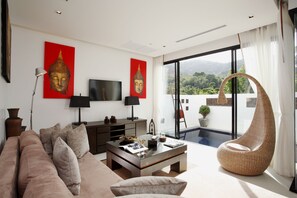 55-inch flat-screen TV with cable channels, LCD TV, DVD player - By The Lake Villas (Rawai)