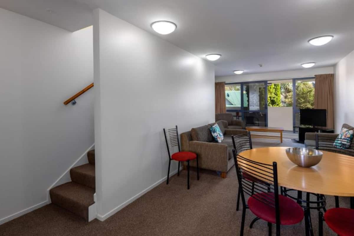 1 bedroom, blackout drapes, soundproofing, iron/ironing board