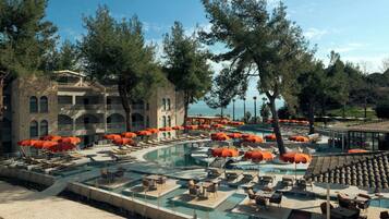 2 outdoor pools, pool umbrellas, pool loungers