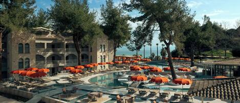 2 outdoor pools, pool umbrellas, sun loungers