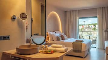 Garden Hideaway Retreat | Minibar, desk, blackout drapes, iron/ironing board