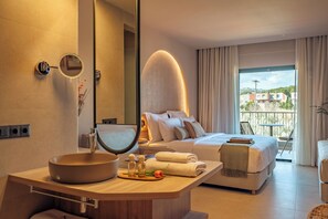 Garden Hideaway Retreat | Minibar, desk, blackout drapes, iron/ironing board