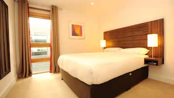Hypo-allergenic bedding, pillow-top beds, in-room safe