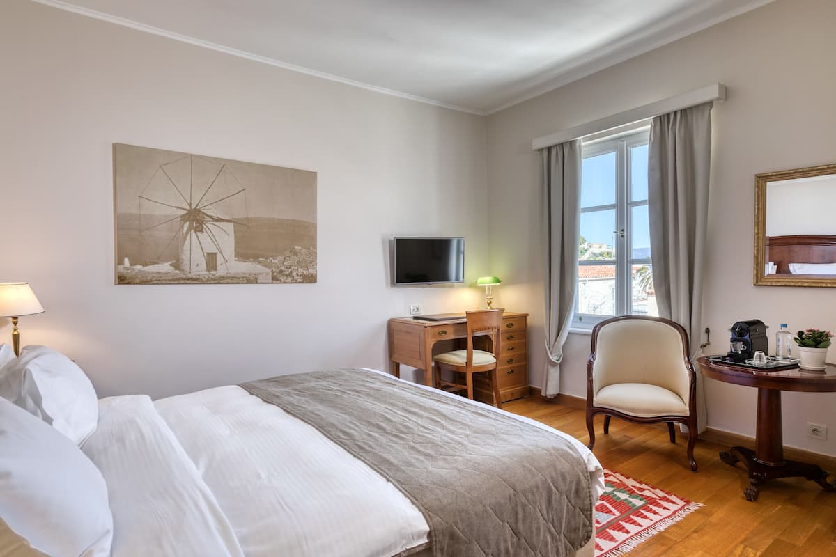 Down duvets, pillow-top beds, minibar, in-room safe