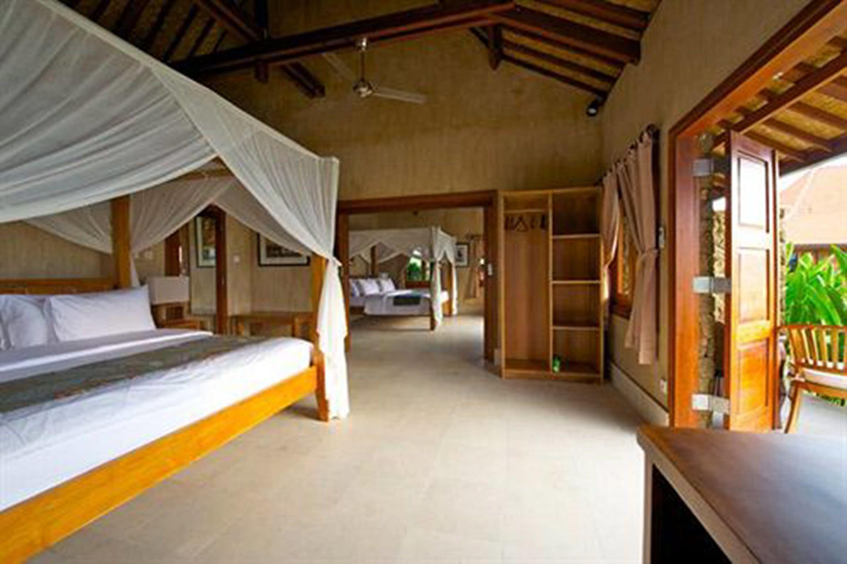 standard room, 1 king bed, refrigerator, pool view | 1 bedroom, select comfort beds, minibar, in-room safe