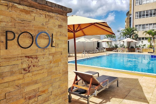 Outdoor pool, open 6:00 AM to 6:30 PM, pool umbrellas, sun loungers