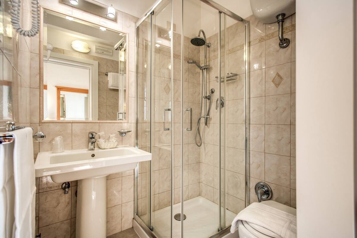 Hair dryer, towels, soap, toilet paper