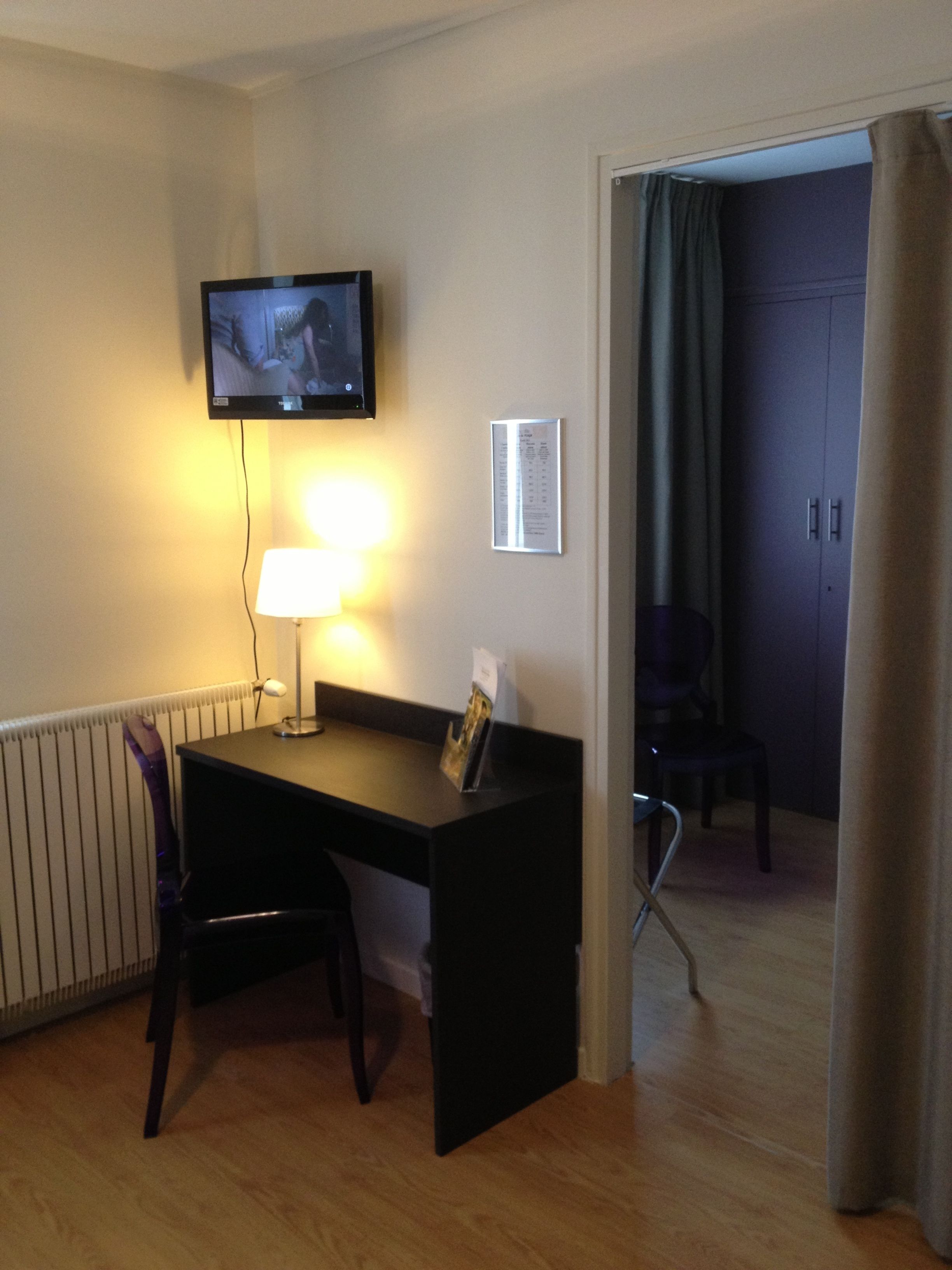 triple room, city view | 4 bedrooms, in-room safe, desk, blackout curtains