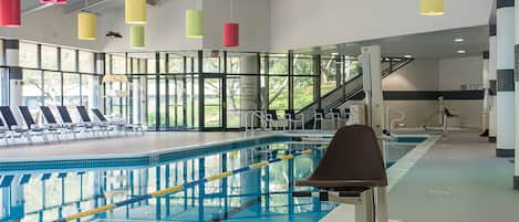 Indoor pool, pool umbrellas, pool loungers