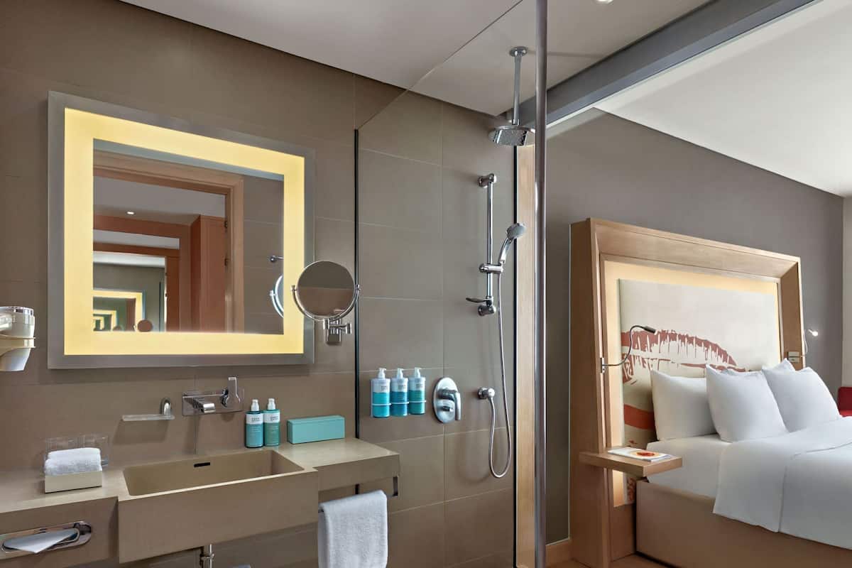 Rainfall showerhead, eco-friendly toiletries, hair dryer, slippers