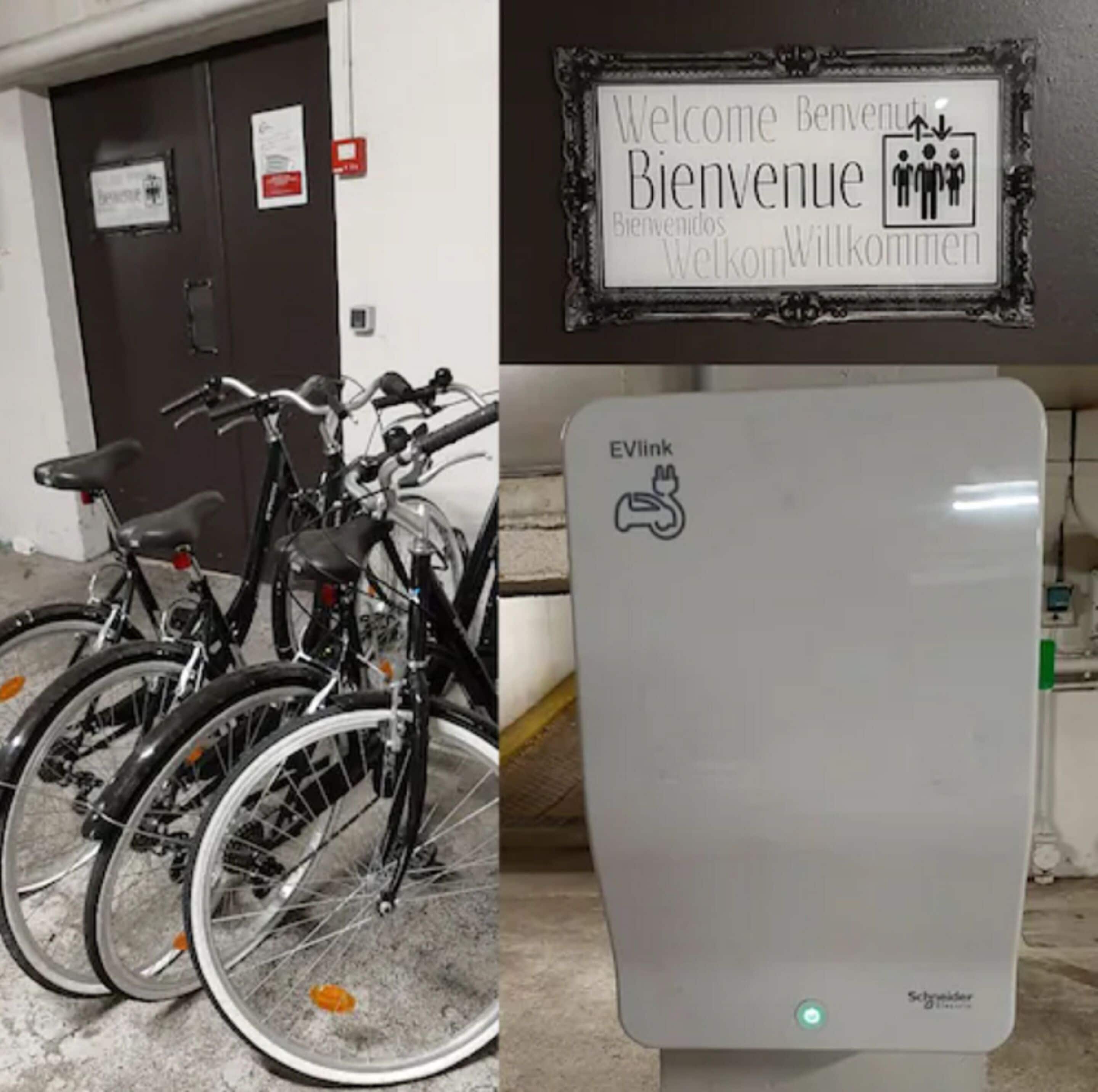 A bicycle parking area with a sign indicating EVlink charging availability.