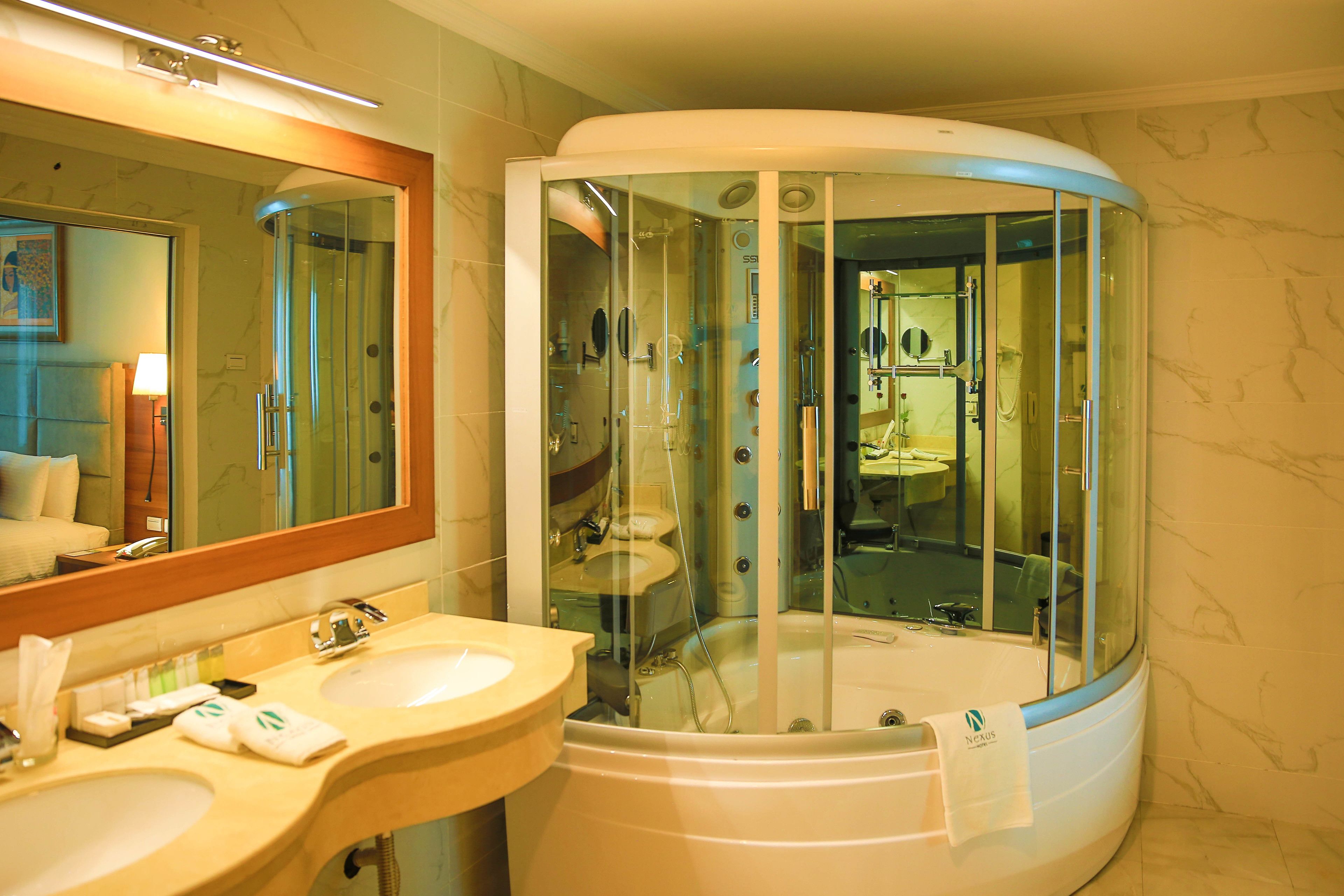 Combined shower/bathtub, deep-soaking bathtub, rainfall showerhead