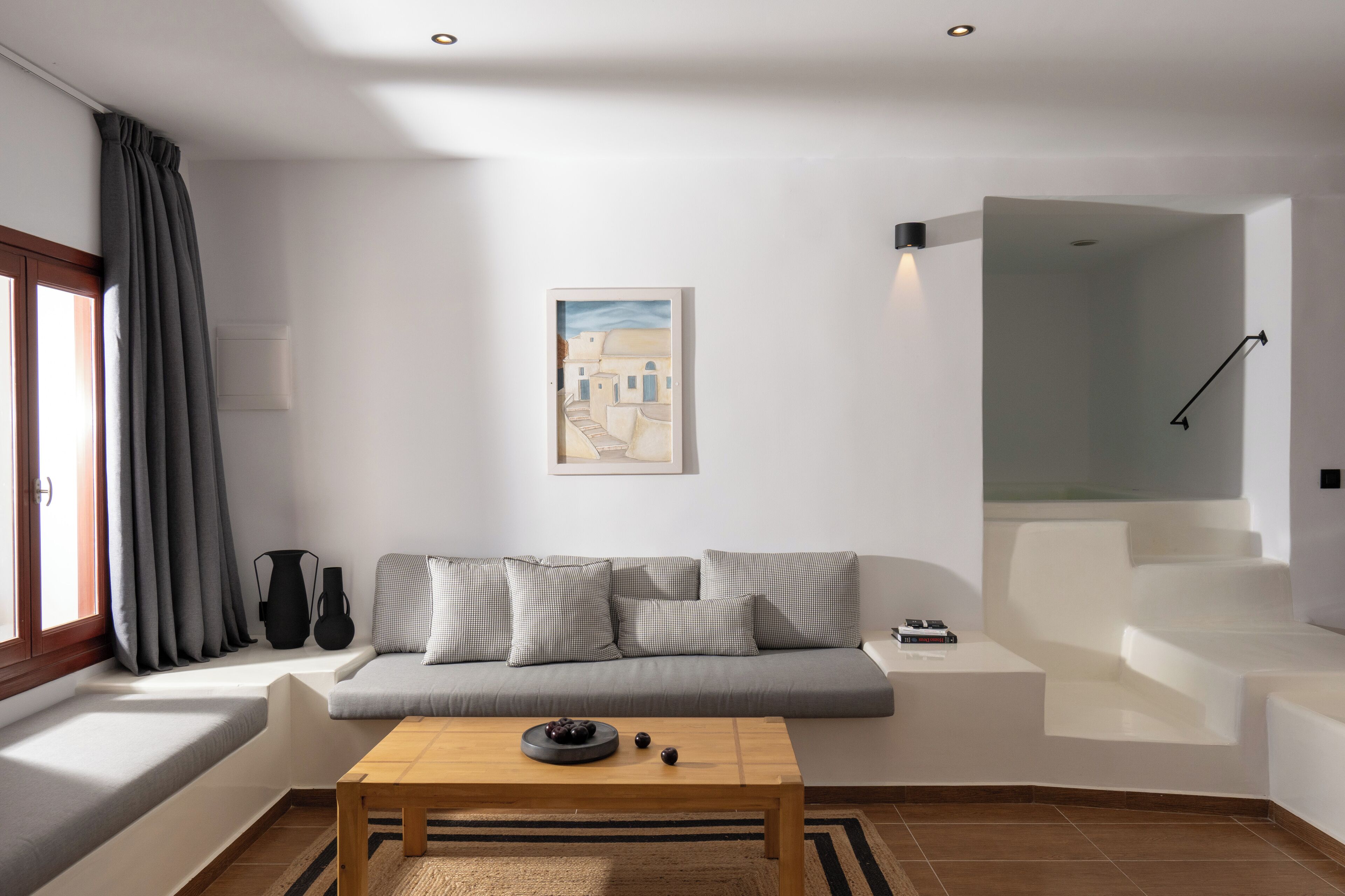 deluxe suite | living area | 32-inch lcd tv with satellite channels, tv, offices