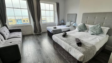 Gold Seaview Family of 3 + Sofa Bed | Individually decorated, individually furnished, iron/ironing board