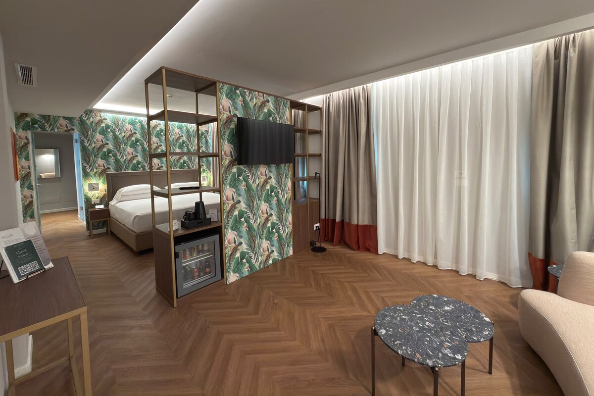 Ropa de cama de alta calidad, cubrecamas y minibar 
