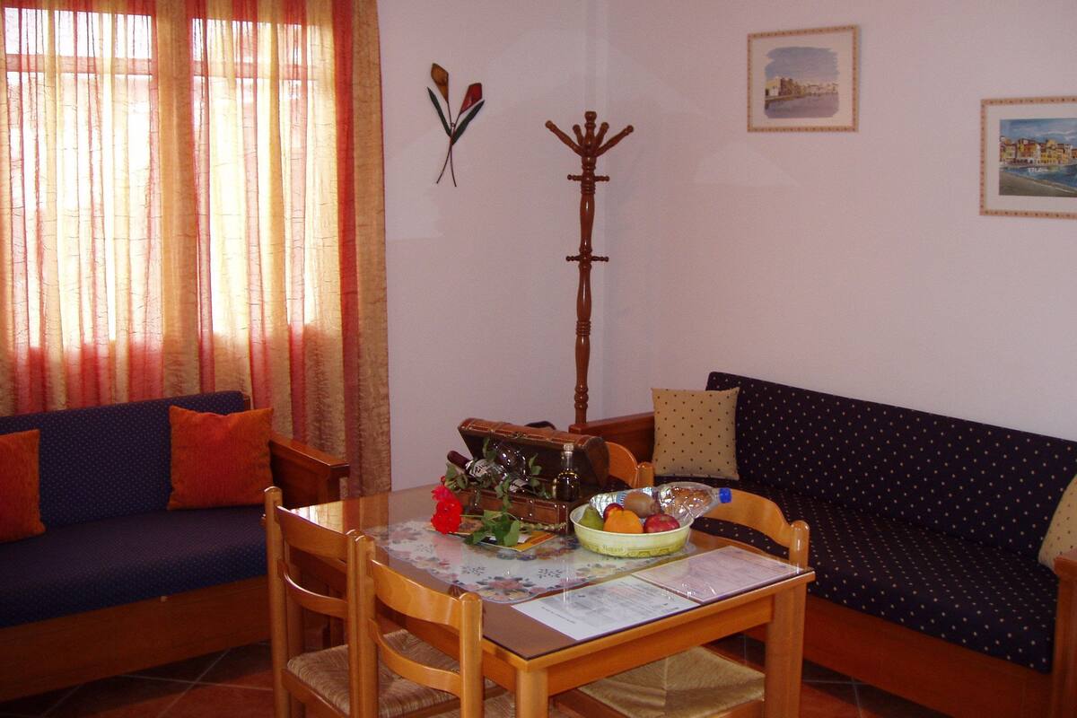 Standard Apartment, 1 Bedroom, Partial Sea View | Living room | LED TV