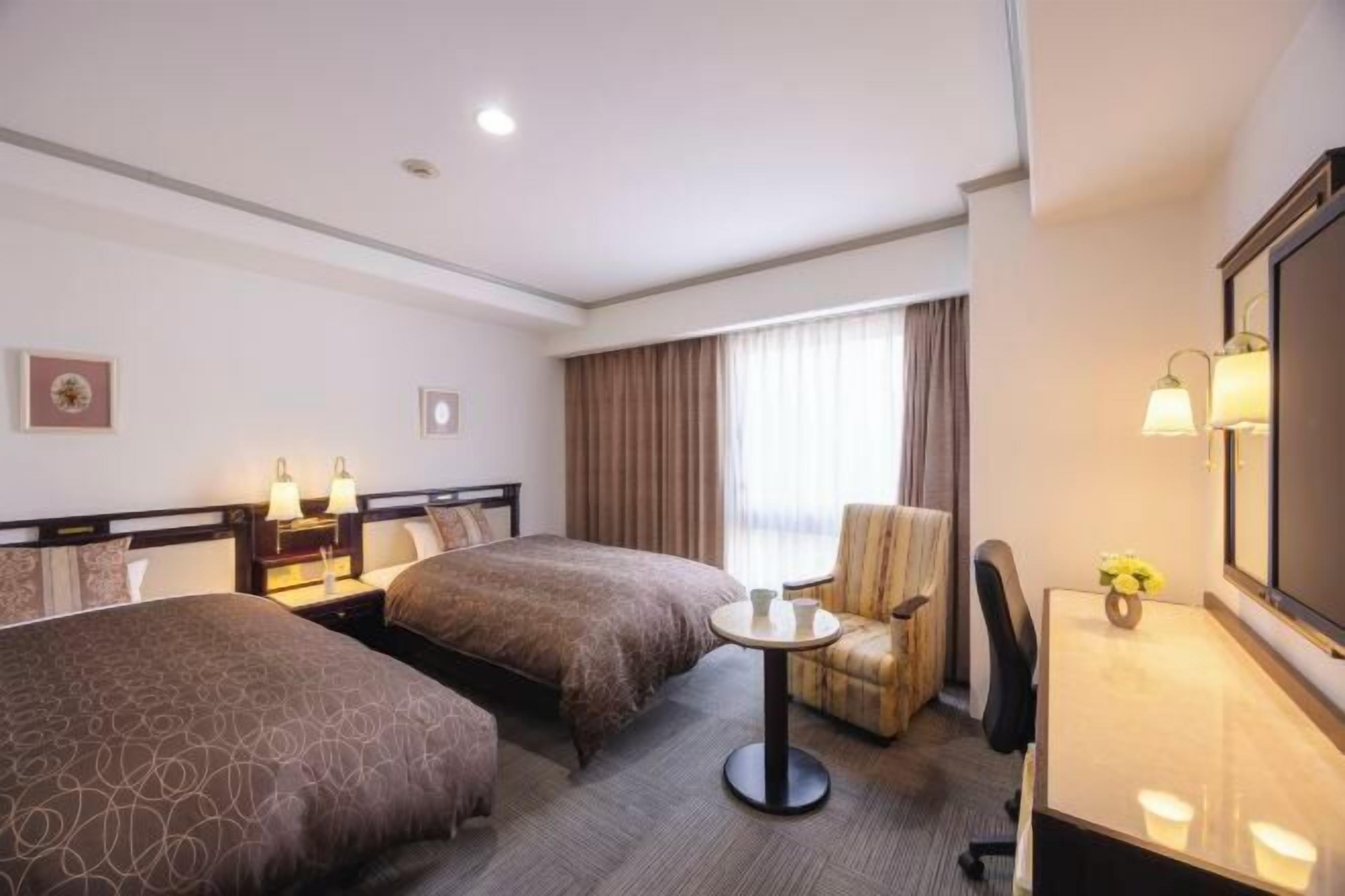 Down comforters, desk, laptop workspace, blackout drapes